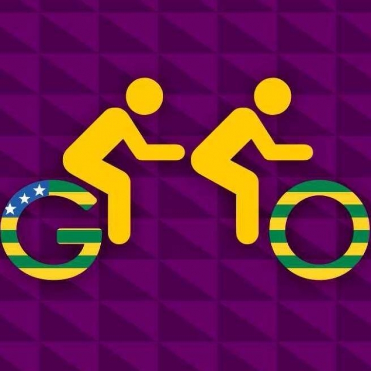 Imagem mostra logotipo do NBDV representado por uma tandem e suas rodas são compostas pelas letras GO de Goiás coloridas pelas cores da bandeira daquele Estado